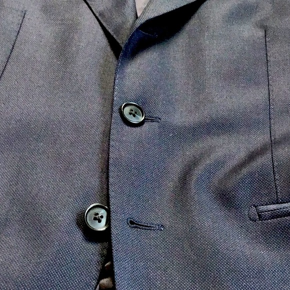 Classic tailored 100% cotton suit.